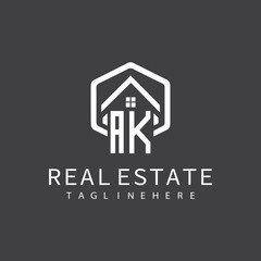 initial monogram logo for real estate with building shape creative design	

