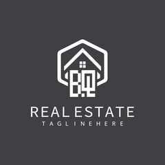 initial monogram logo for real estate with building shape creative design	
