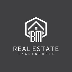 initial monogram logo for real estate with building shape creative design	
