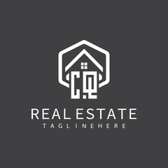 initial monogram logo for real estate with building shape creative design	
