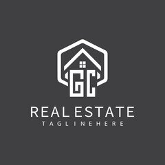 initial monogram logo for real estate with building shape creative design	
