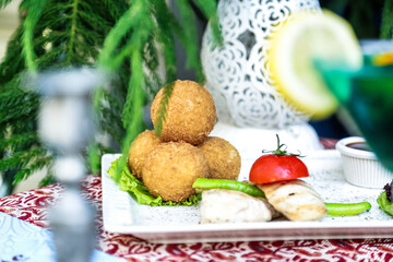 White Plate With Food and Green Drink