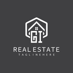 initial monogram logo for real estate with building shape creative design	
