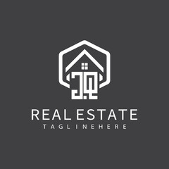 initial monogram logo for real estate with building shape creative design	
