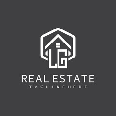 initial monogram logo for real estate with building shape creative design	

