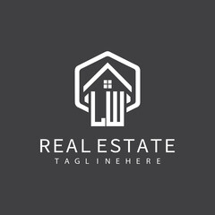 initial monogram logo for real estate with building shape creative design	
