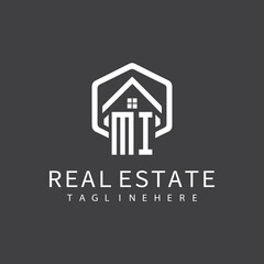 initial monogram logo for real estate with building shape creative design	
