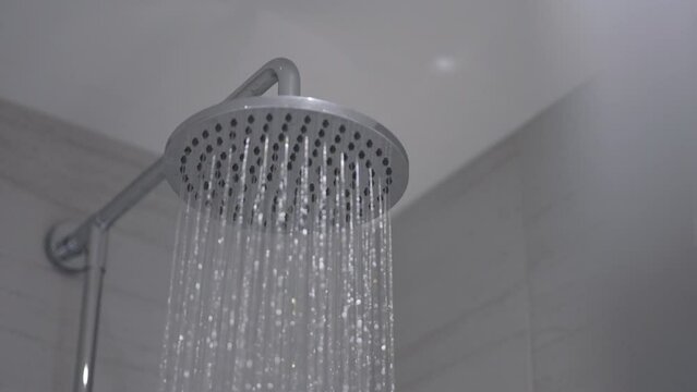 Shower Head Flowing Slowly Turning Off. Left To Drip. Wide Static.