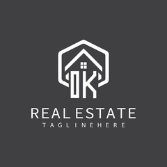 initial monogram logo for real estate with building shape creative design	
