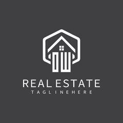 initial monogram logo for real estate with building shape creative design	
