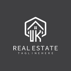 initial monogram logo for real estate with building shape creative design	
