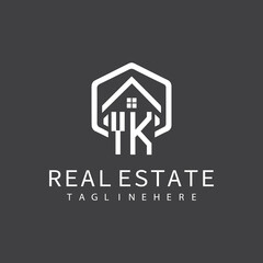 initial monogram logo for real estate with building shape creative design	
