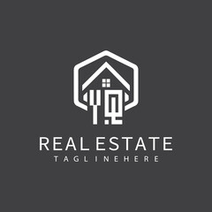 initial monogram logo for real estate with building shape creative design	

