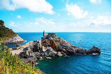 Charming, beautiful view overlooking the sea and gothic Church of St. Peter in Porto Venere, Liguria, Italy. Exotic amazing places. Popular tourist atraction.