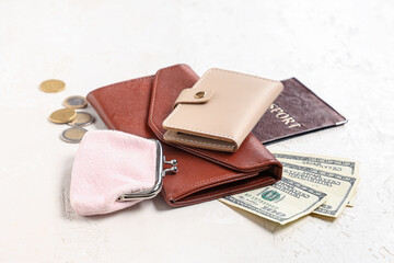 Composition with beige credit holder, wallet, money, passport and purse on light background, closeup