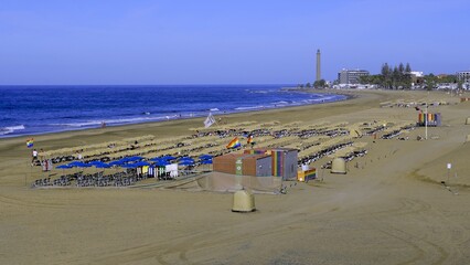 Maspalomas, Canary Islands, Spain, Europe - May 6, 2024 - Nudist beach decorated with rainbow flags...