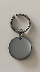 Metal keychain with a round metal tag. . Vertical background 