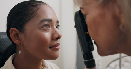 Woman, checkup and optician for vision, healthcare and eye exam with retinoscope test. Specialist,...