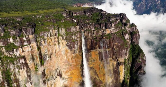 Angel Falls Cascading On Rocky Mountain In Canaima National Park, Venezuela. aerial, slow motion