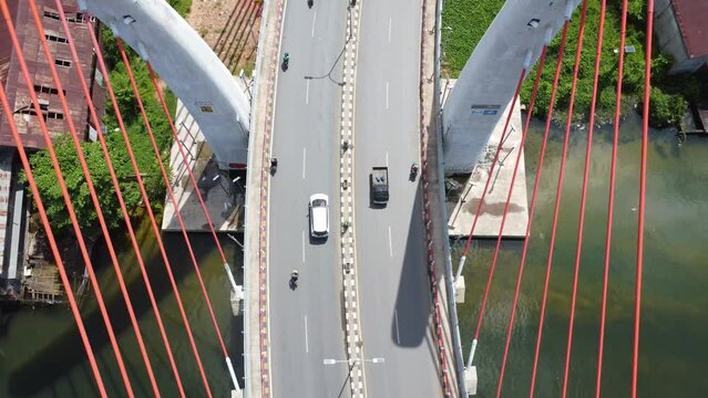 Aerial view of the Sei Alalak Bridge located in Banjarmasin which is known as the first arched bridge in Indonesia