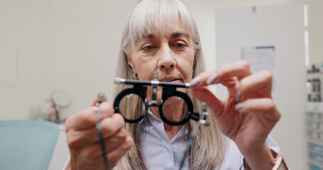 Mature woman, optometrist and glasses for eye lens or equipment for examination and vision testing....