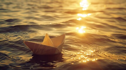 Small paper boat floating on sunlit water surface with reflection, tranquil scene