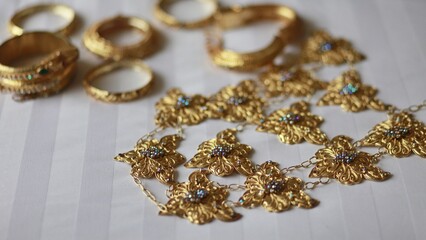 Gold colored jewelry accessories to build an image of luxury and beautify appearance.