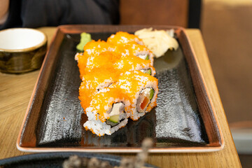 Maki Sushi, California Rolls with Cucumber, Avocado, Raw Fish and Red Tobiko Caviar, Makizushi