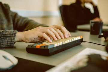 Hands working with a computer keyboard at work. Business and development concept. IT company