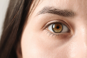 Macro photo of woman with beautiful eyes