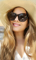 Beauty, summer holiday and fashion, face portrait of happy woman wearing hat and sunglasses by the sea, for sunscreen spf cosmetics and beach lifestyle look idea