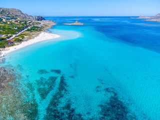 Aerial view of La Pelosa beach turquoise sea and white sand