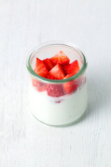 Delicious Greek yogurt with seasonal strawberries