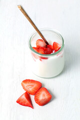 Delicious Greek yogurt with seasonal strawberries