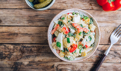 American Potato Salad in a bowl on wooden table