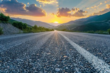 Scenic highway leads to a sunset-lit mountain range on an open road journey. Beautiful simple AI generated image in 4K, unique.