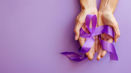 on world lupus day and world cancer day adult hands holding purple ribbon on purple background