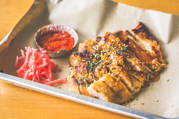 A La Carte Grilled Pork Cheek served with pickled ginger and chilli sauce