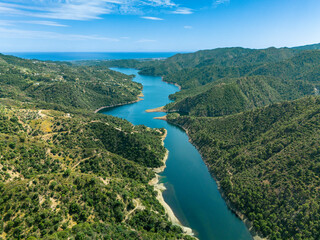 Experience the picturesque charm of Ist&aacute;n from a bird's-eye perspective, as the drone captures its quaint streets and stunning mountain backdrop