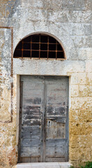 ancient portals in the historic center of pat&ugrave; salento italy