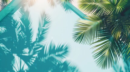 Fototapeta na wymiar A blue pool stands in the foreground while palm trees sway in the background under a clear sky