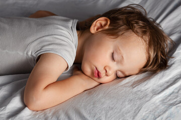 Cute small baby sleeping on the blanket
