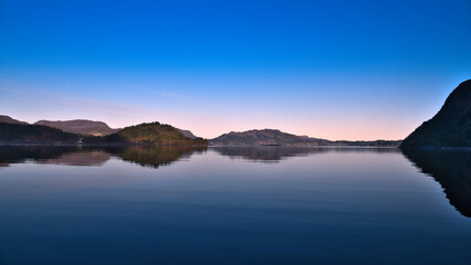 Fjord with view of mountains and fjord landscape in Norway. Landscape in evening