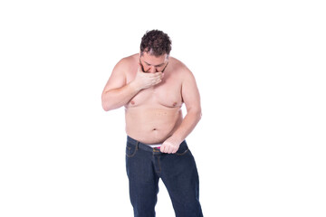 Men's health and erection problems. Fat man posing on a white background.