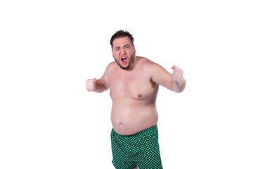 Funny fat man makes faces on a white background. Fun and joy.