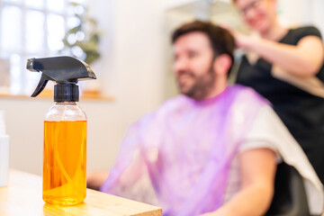 Water to spray the hair of clients in the salon