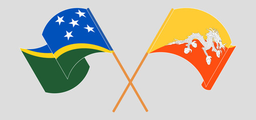 Crossed and waving flags of Solomon Islands and Bhutan