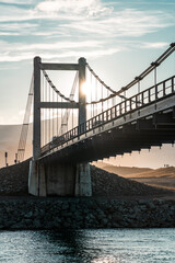 Big bridge at sunset. Backlit photos, architecture, streets, non-urban areas. Þjóðvegur 1 bridge, Ring Road of Iceland.