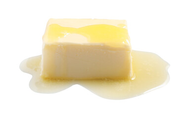 Piece of melting butter on white background