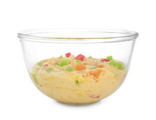 Raw dough with candied fruits in bowl isolated on white